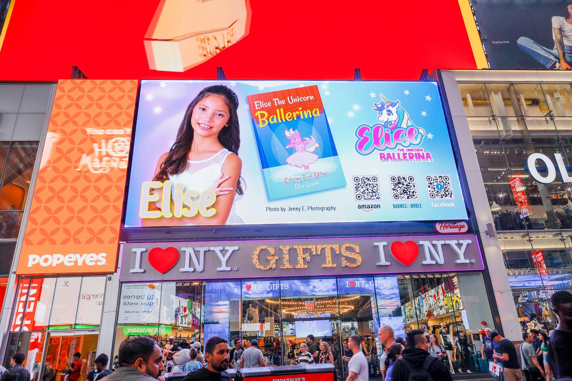 Billboard displaying "Brooklyn New York NY 100000" against a clear sky backdrop.